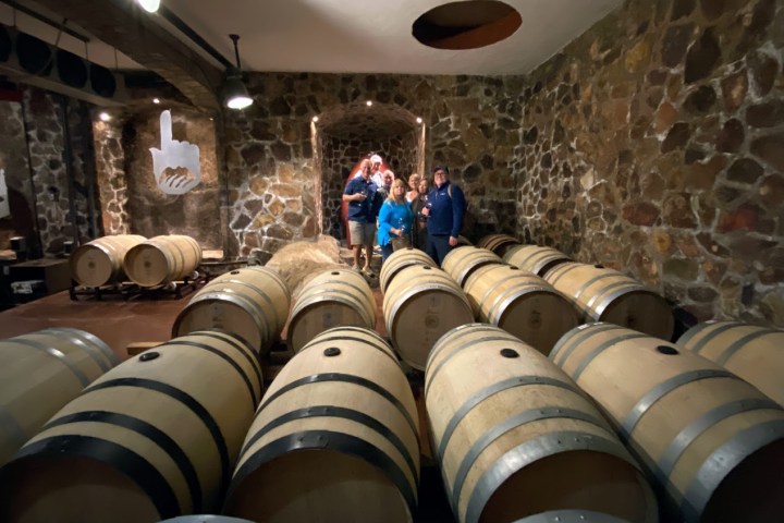 a barrel sitting next to a building